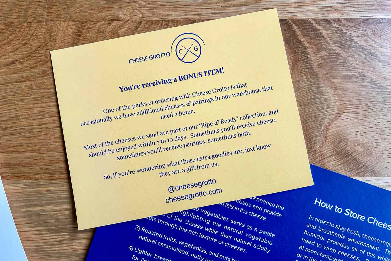 A yellow flyer from Cheese Grotto describing bonus item details