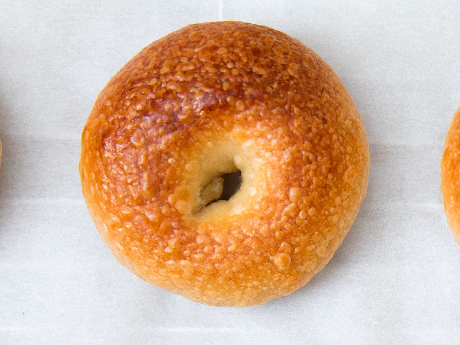 Close-up of a mini bagel, fresh from the oven.