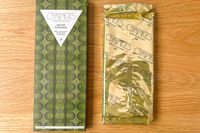 Compartés Salted Pistachio on a wood surface