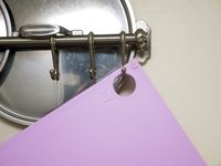 a closeup of the hanging hole on the material reboard