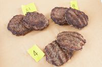 Three sets of burgers numbered to show which pan they were cooked on.