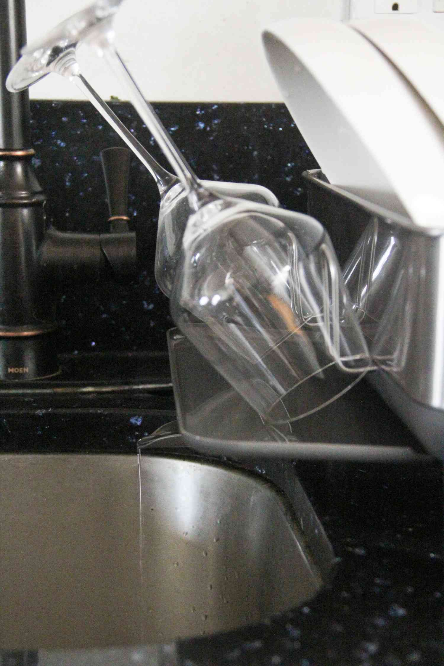 Close-up of wine glasses on the Simplehuman Standard Steel Frame Dish Rack