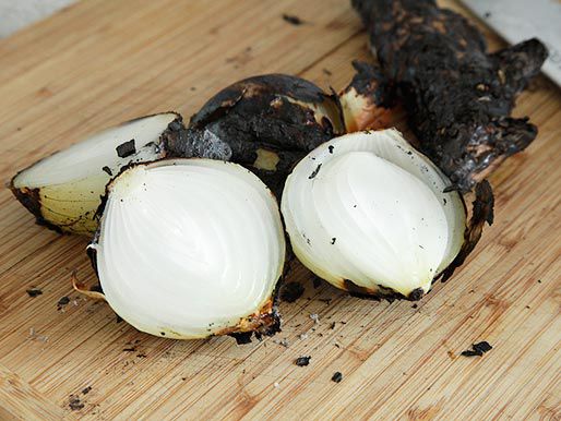 Blackened onion after being grilled on a gas burner for pho. 