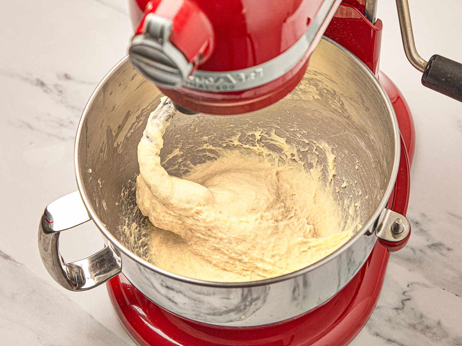 Overhead view of dough sticking to dough hook