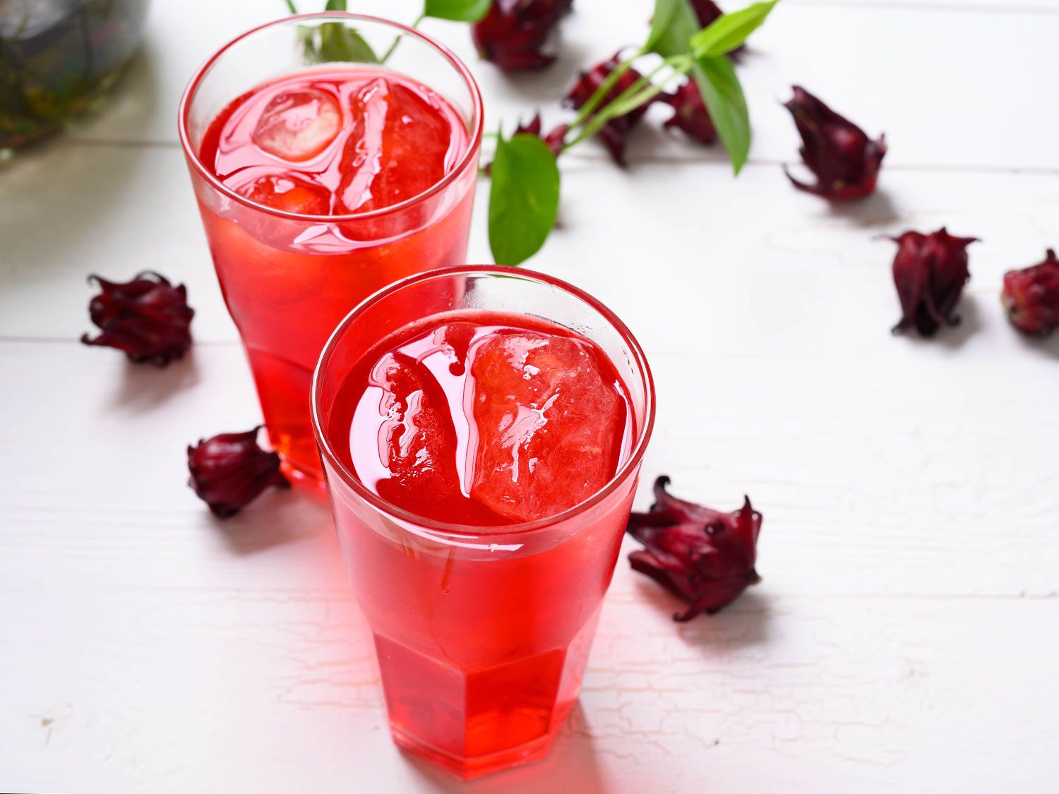 2 glasses of sorrel with ice on a white background