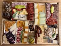 The Boarderie charcuterie board arranged on a tabletop