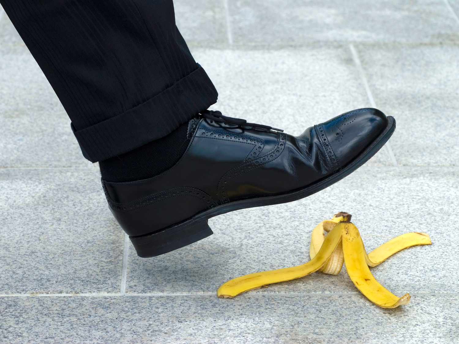 Stock image of someone stepping on a banana peel