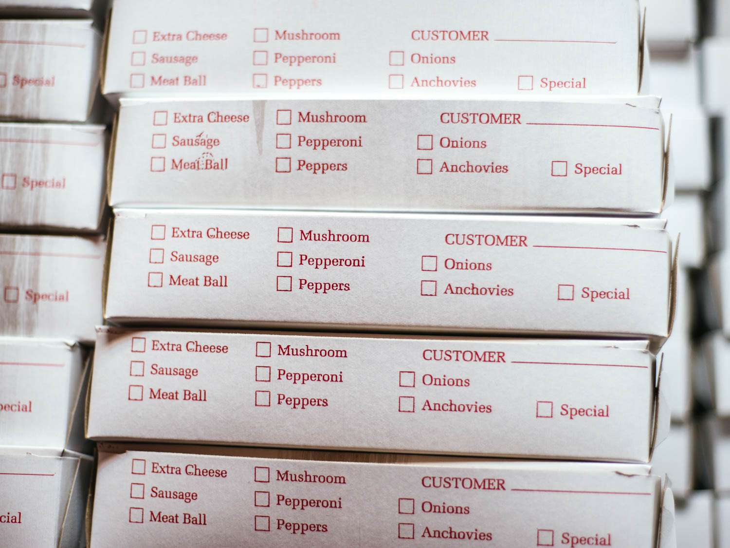 stacks of pizza boxes