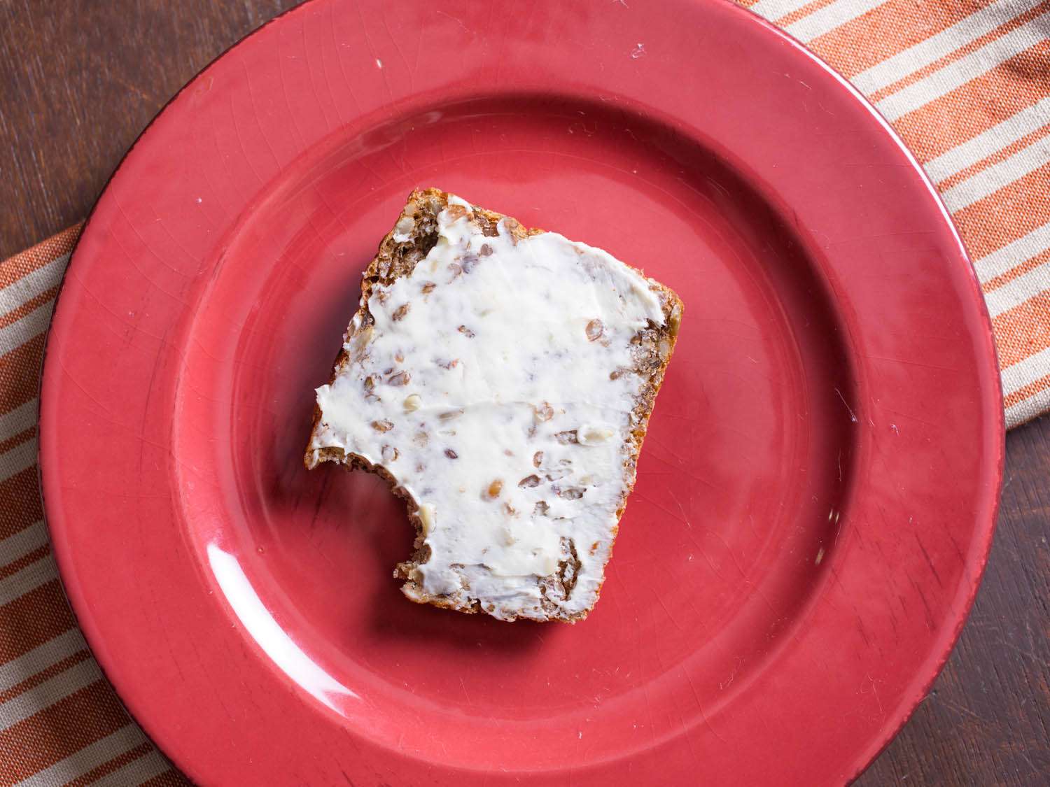 A simple smørrebrød on a red plate. 