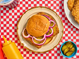 Overhead view of breaded pork tenderloin sandwich