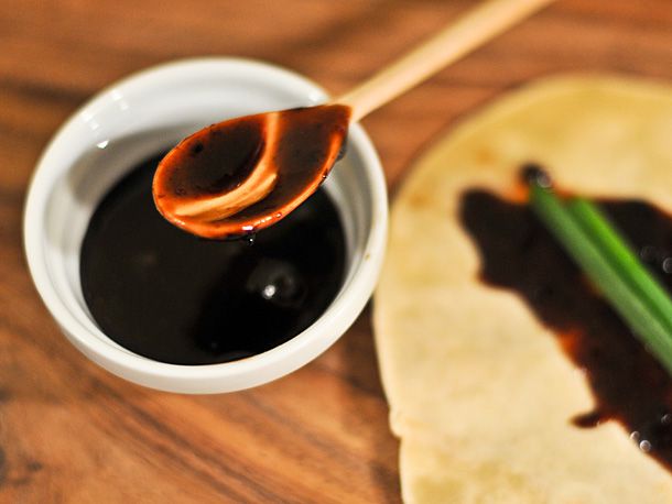 A ramekin of homemade hoisin sauce. A hoisin-smeared Mandarin pancake is visible off to the side.
