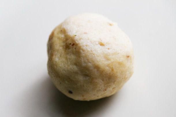 Close-up of a dry, uncooked matzo ball