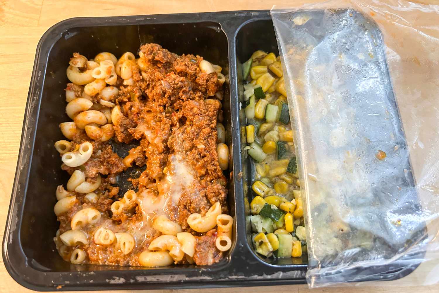 A Factor meal on a wood surface