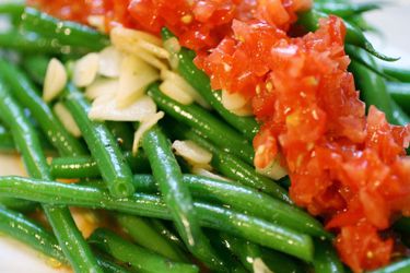 Closeup of Crisp Haricots Verts Salad with Fresh Tomatoes and Garlic.