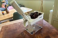 The Leifheit cherry pitter full of cherries