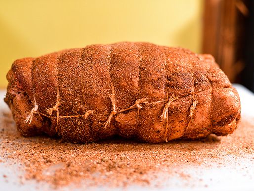 The lamb shoulder, tied and rubbed with seasonings.