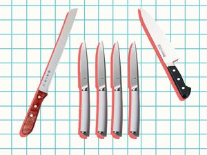 Assorted kitchen knives arranged on a grid backdrop