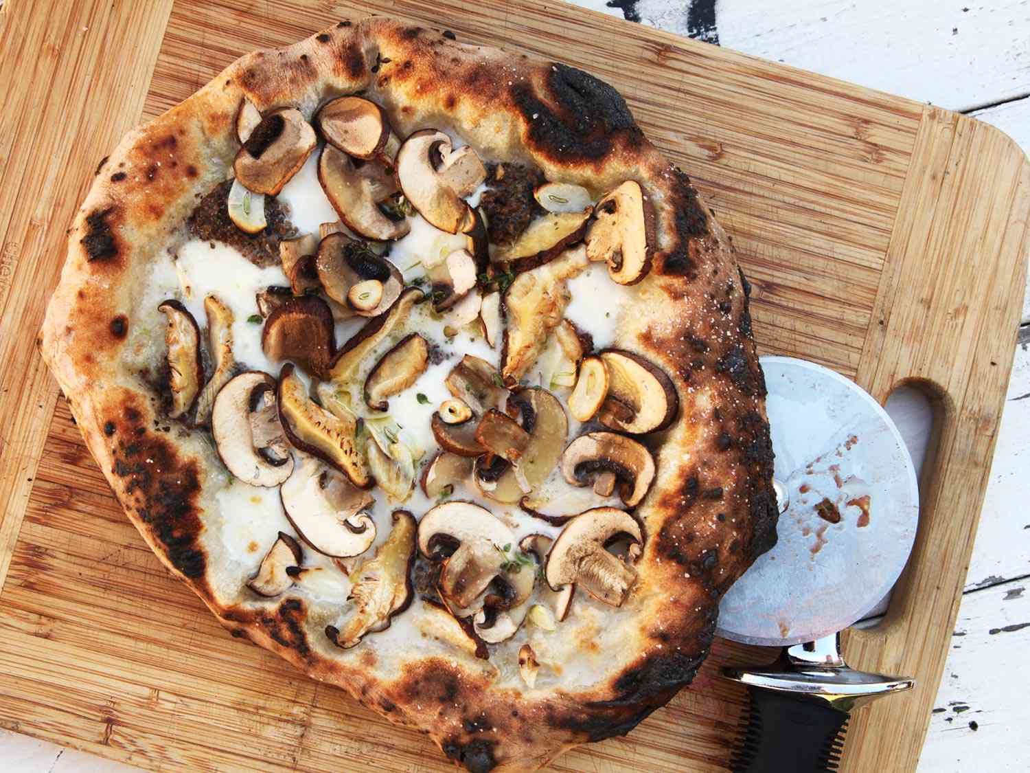 Pizza With Mushrooms, Mozzarella, and Truffle