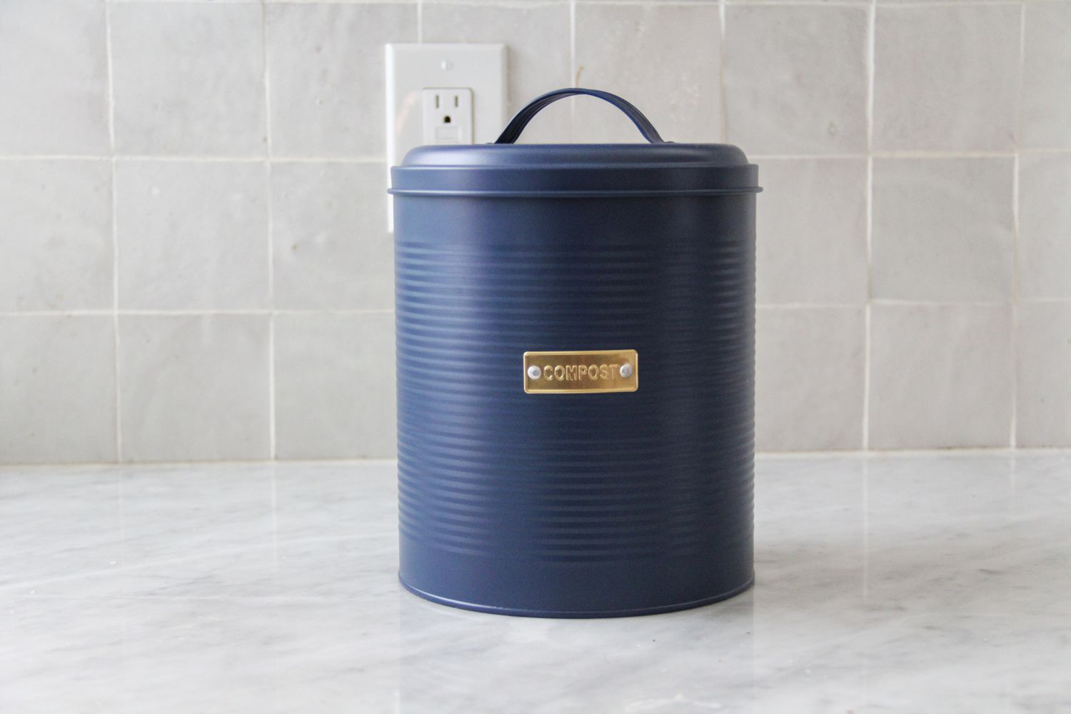 Typhoon compost caddy on a counter