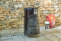 The Pit Barrel Cooker Co. Classic Pit Barrel Cooker on a patio