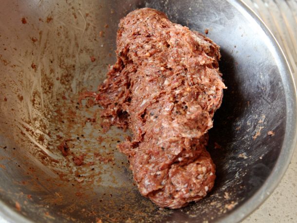 Kebab meat mixture in a mixing bowl. 