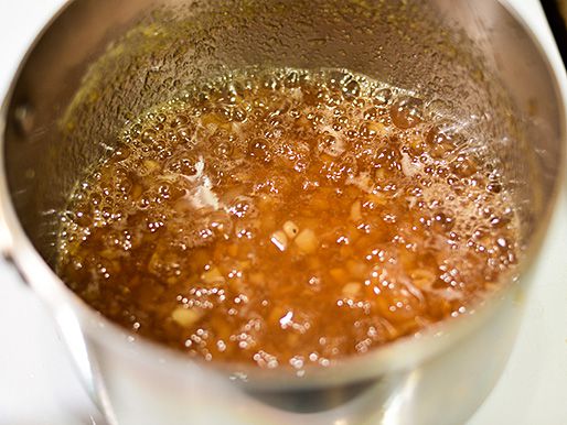 Boiling pot of pear and ginger preserves.