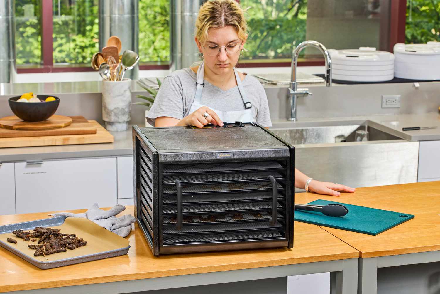 A person testing Excalibur Electric Food Dehydrator Machine