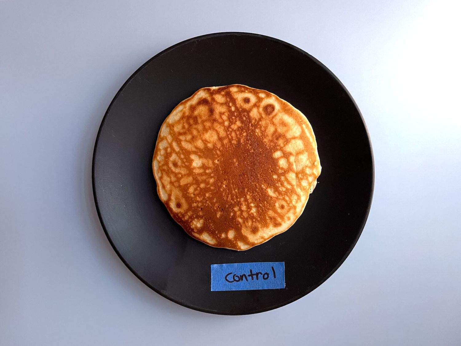 Pancake on a black plate