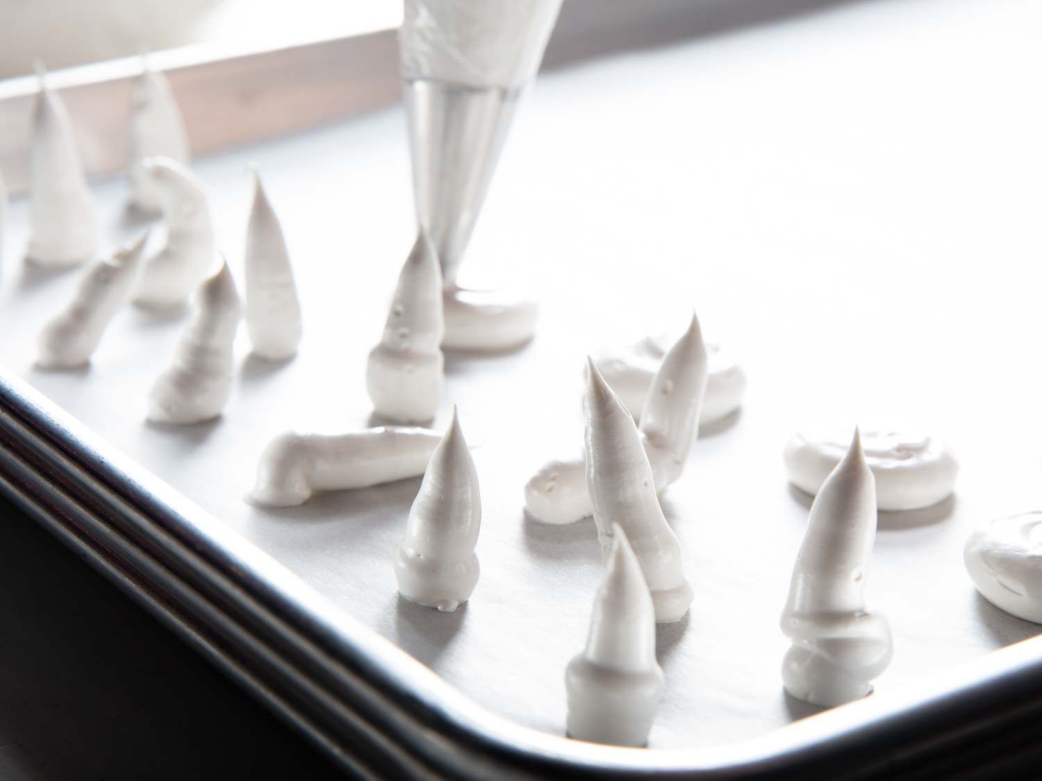 Piping a tray of mushroom stems