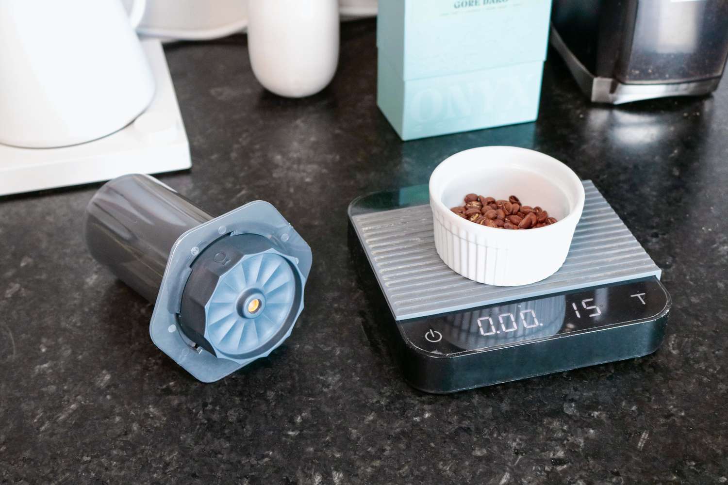 a small amount of coffee beans on a scale