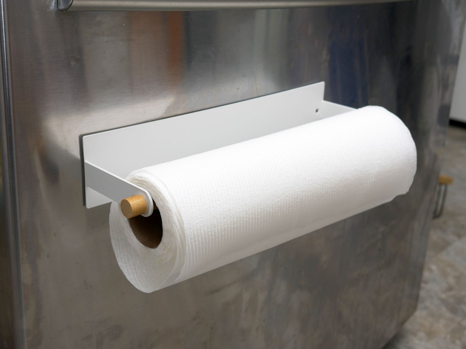 the yamazaki paper towels magnetic holder on a refrigerator