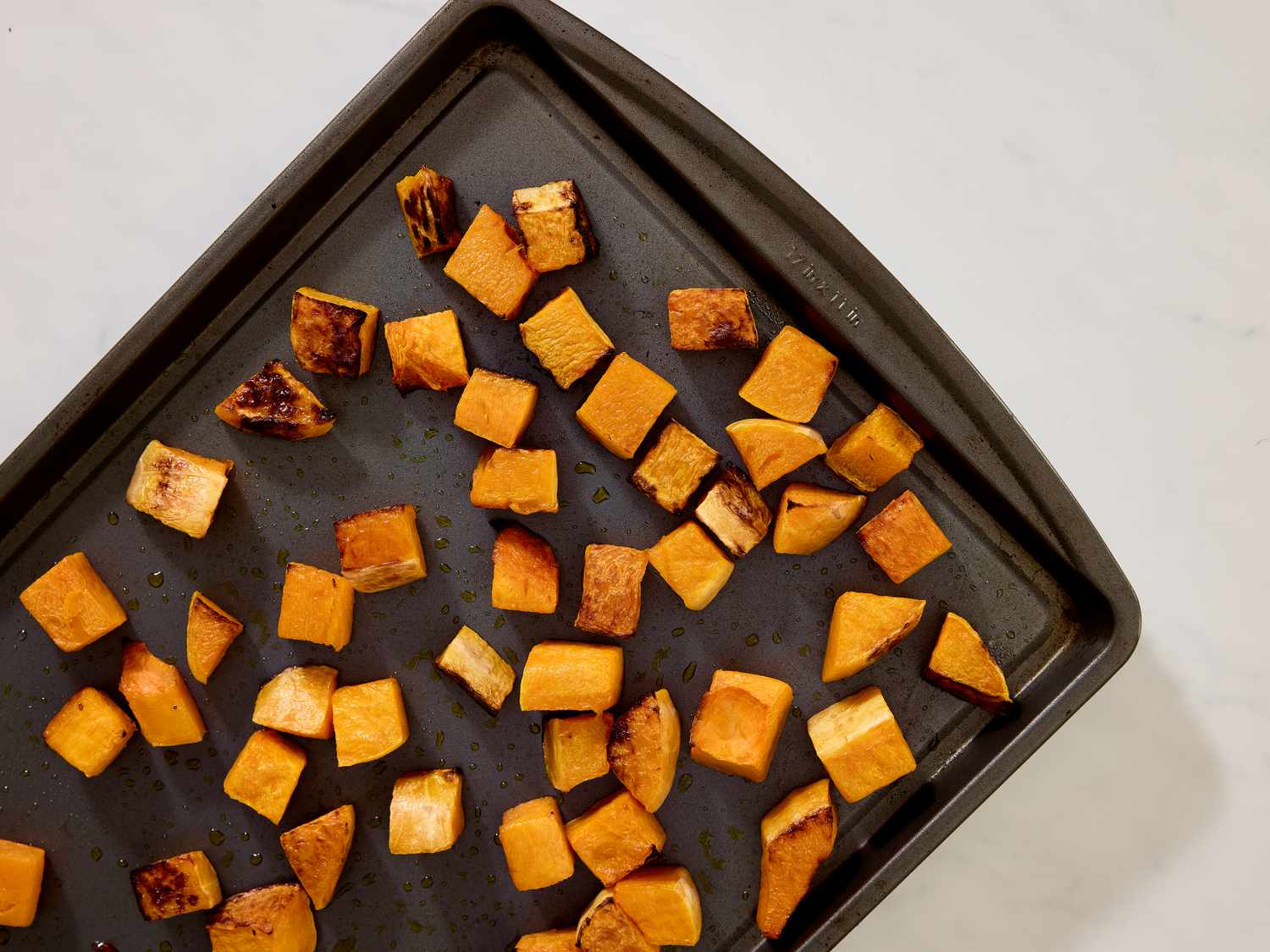 Sheet pan with roasted squash squares
