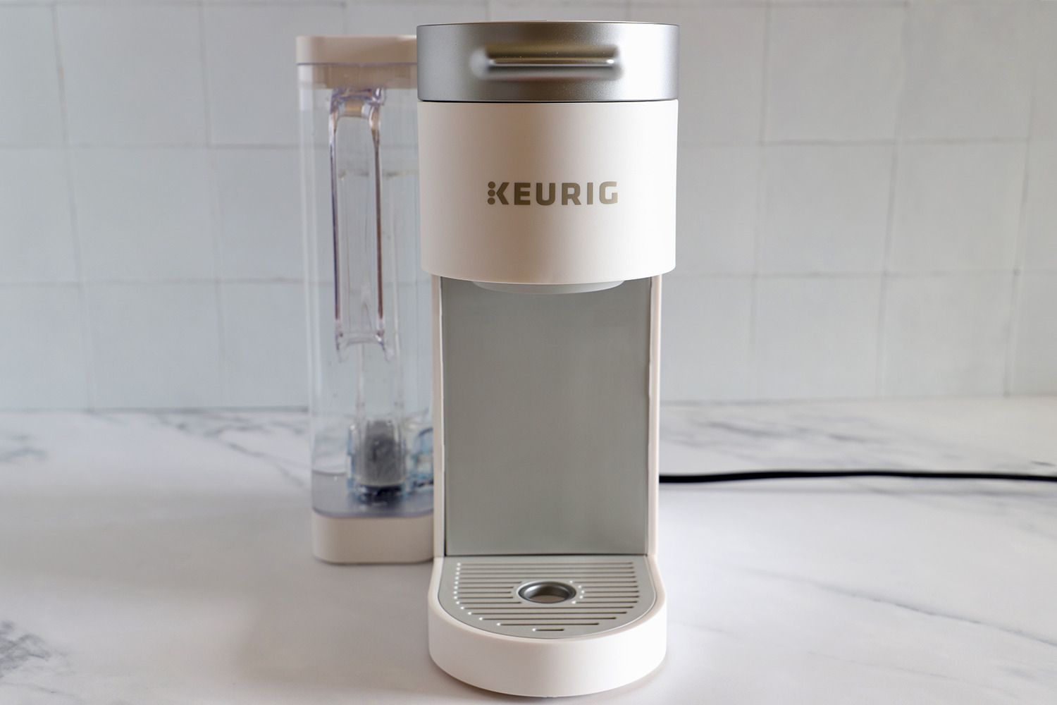 Keurig K-Supreme Single Serve K-Cup Pod Coffee Maker on white counter top