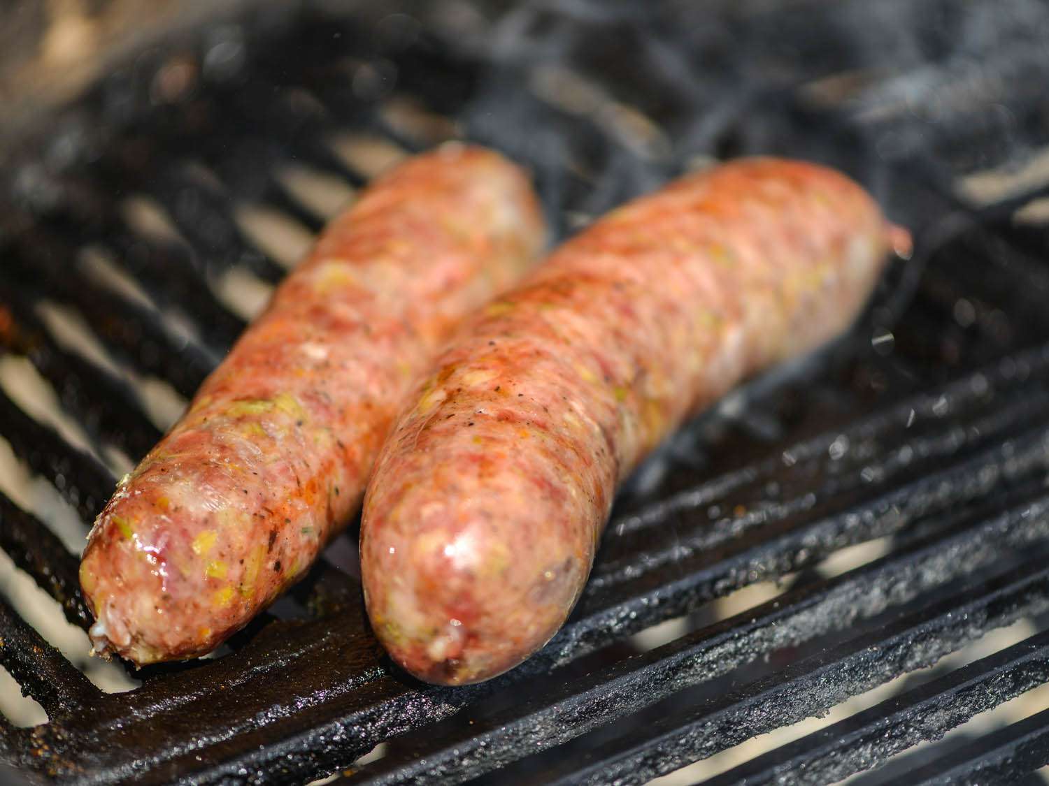 The smoked loukaniko links are grilled over high heat to cook through and char slightly.