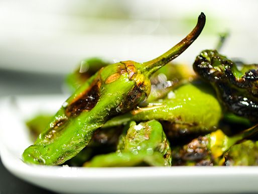Closeup of the finished Padrón peppers, ready to serve.