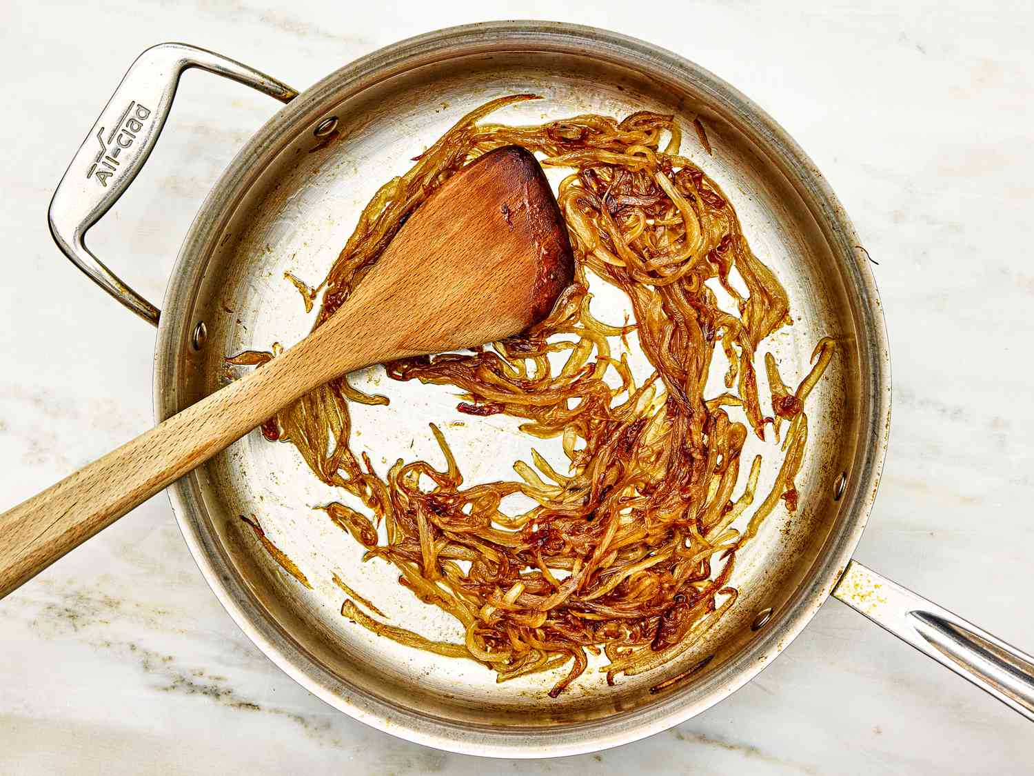 Overhead view of cooking onions