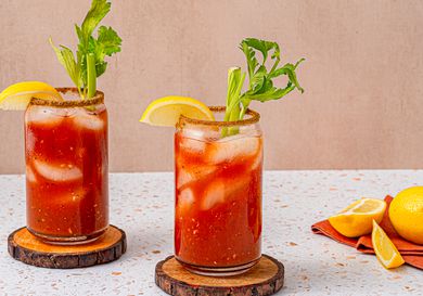 Two bloody marys one wooden costers