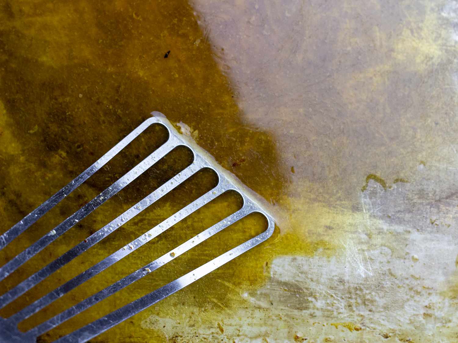 Rendered chicken fat into a heatproof bowl.
