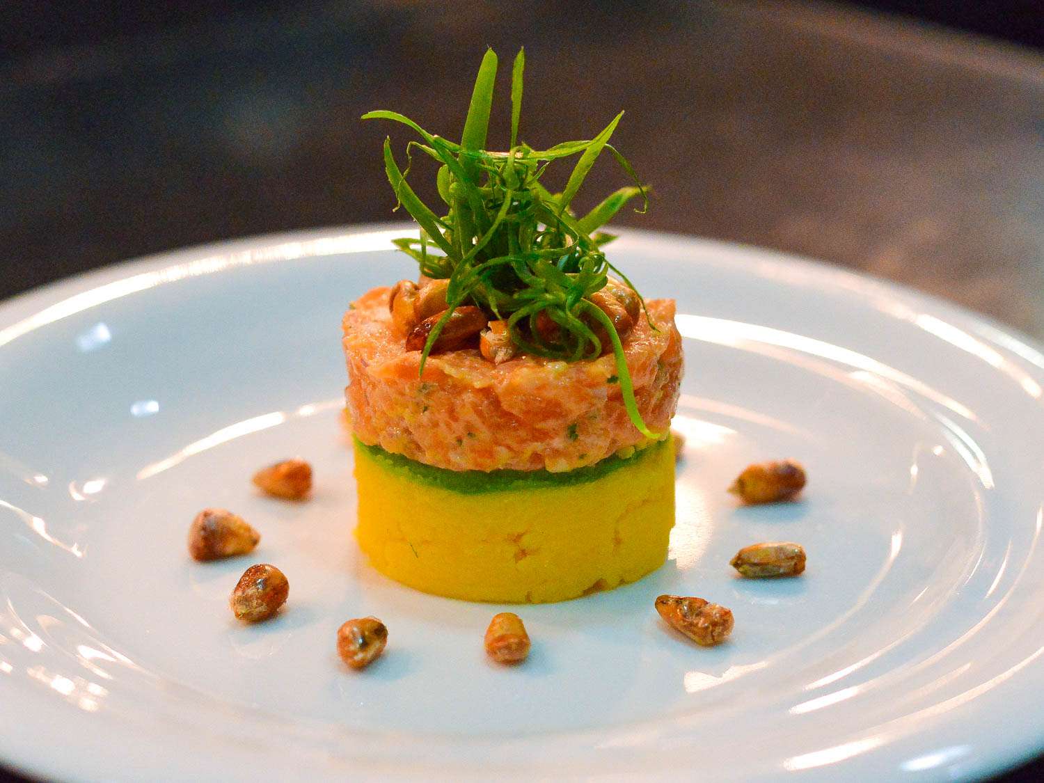 An upscale version of causa, a potato, meat, and avocado layered.