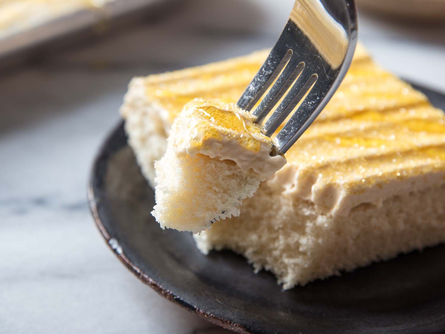 close up of cake with honey buttercream