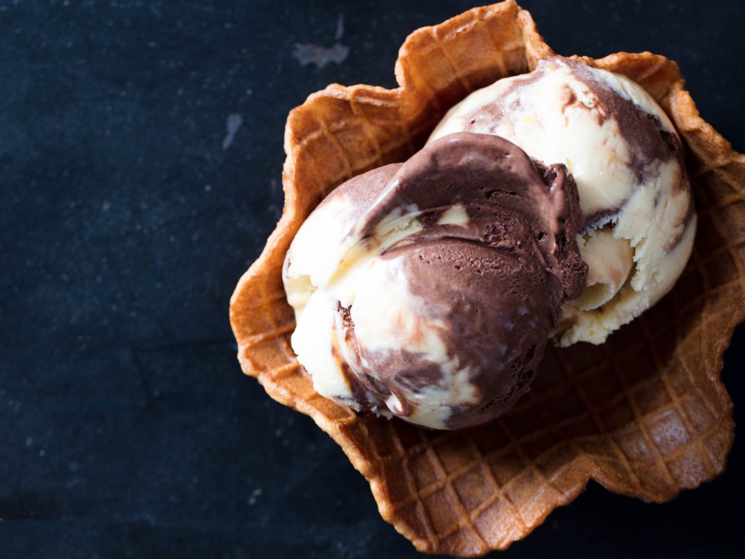 a homemade waffle bowl with ice cream