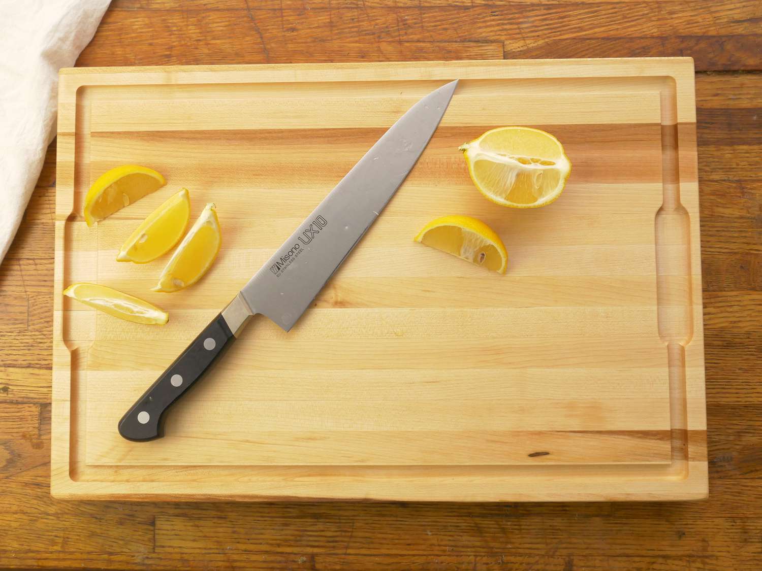 made in cutting board with a sliced lemon
