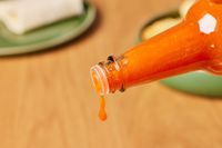 Marie Sharp’s Habanero Hot Sauce being poured