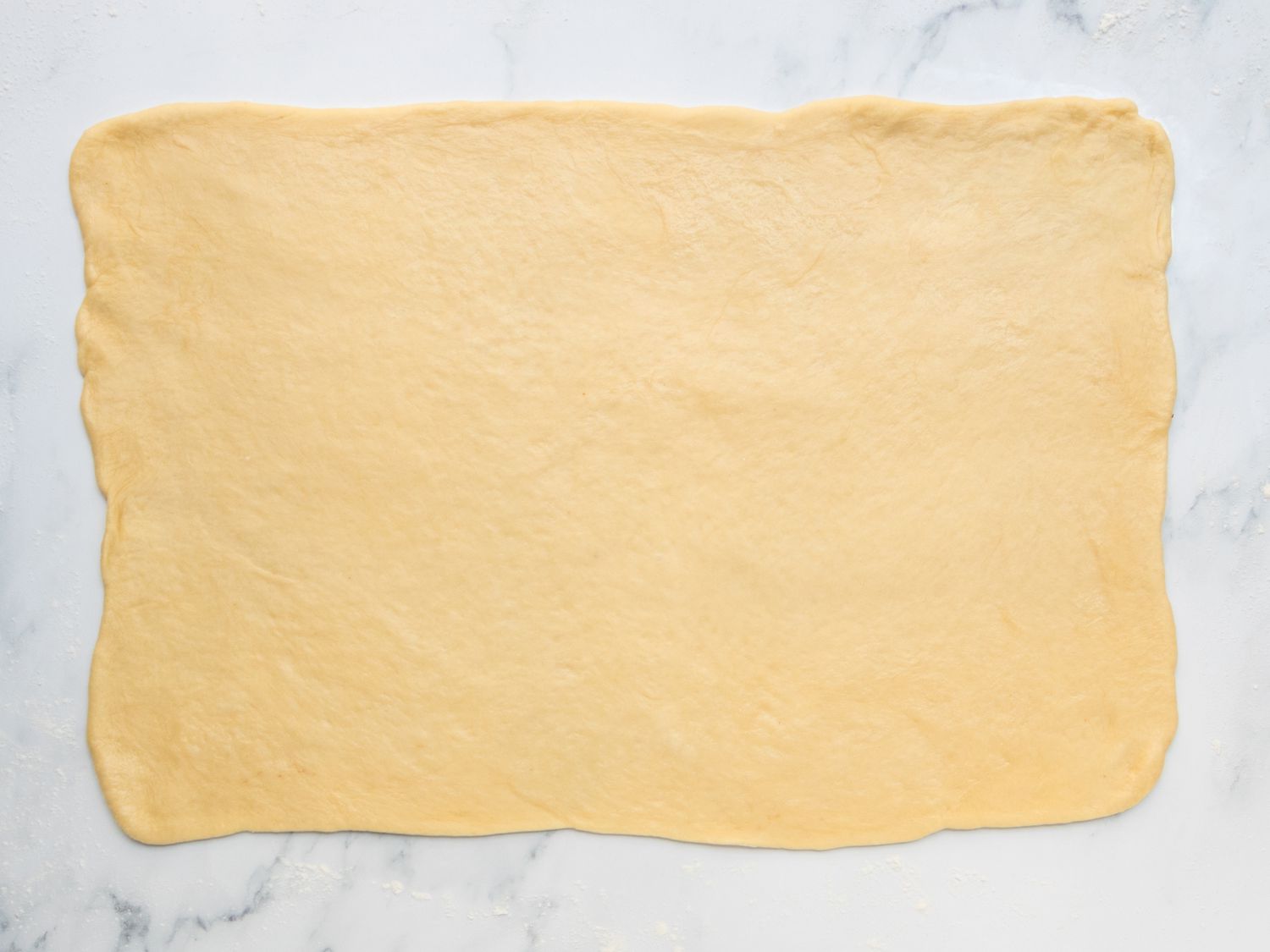 Rolled out dough to a 12 x 17 inch rectangle 