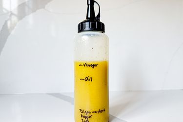 Squeeze bottle with vinegar and oil