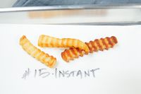 Cooked fries with label