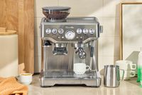 The Breville The Barista Express Espresso Machine on a kitchen countertop