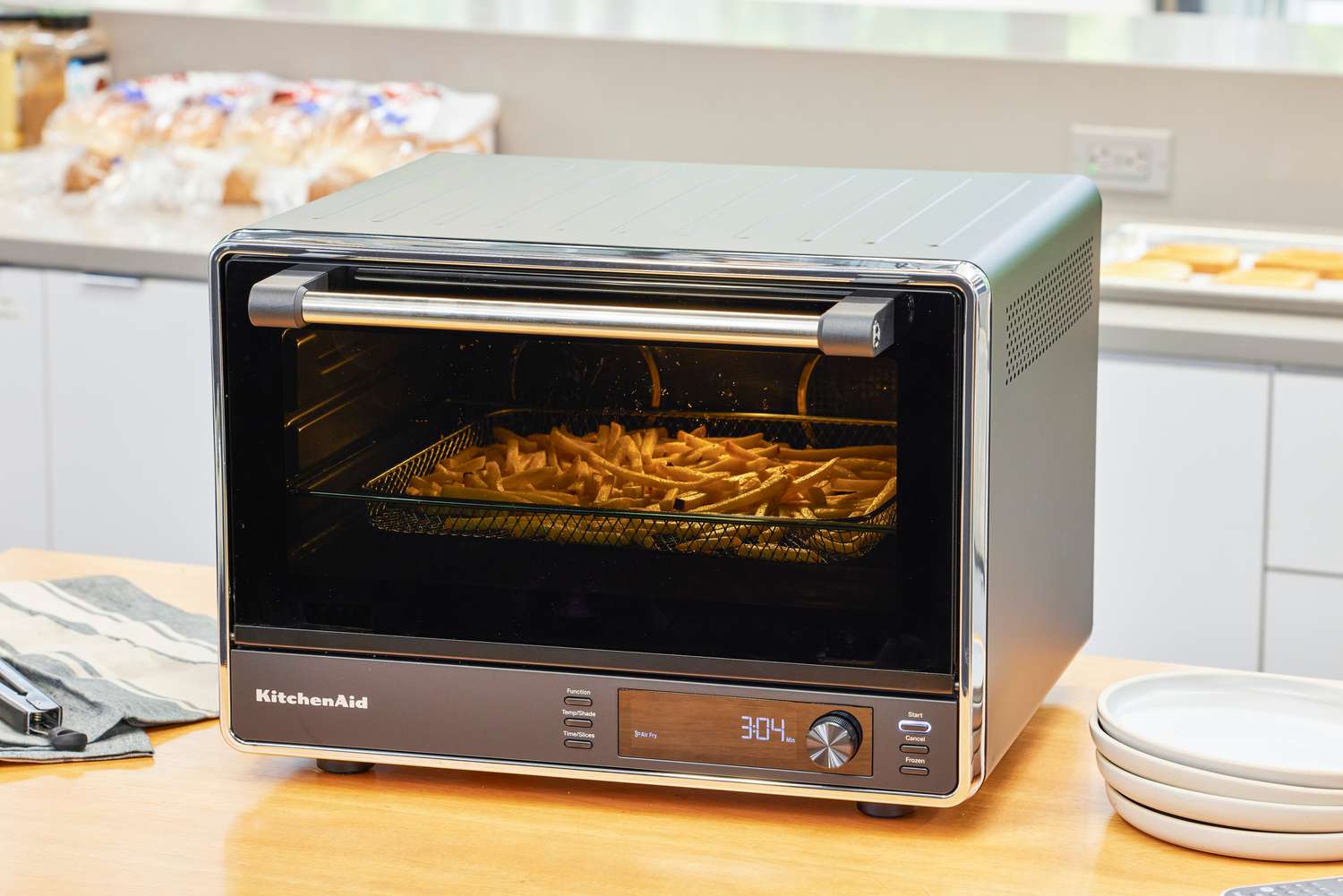 Fries cooking in the KitchenAid Dual Convection Countertop Oven with Air Fryer