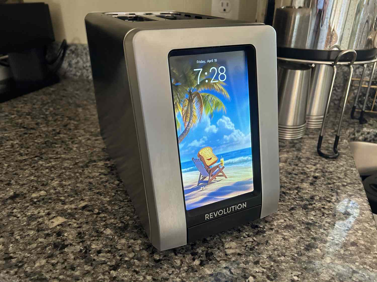 The Revolution R180 Smart Connect Plus toaster on a granite counter