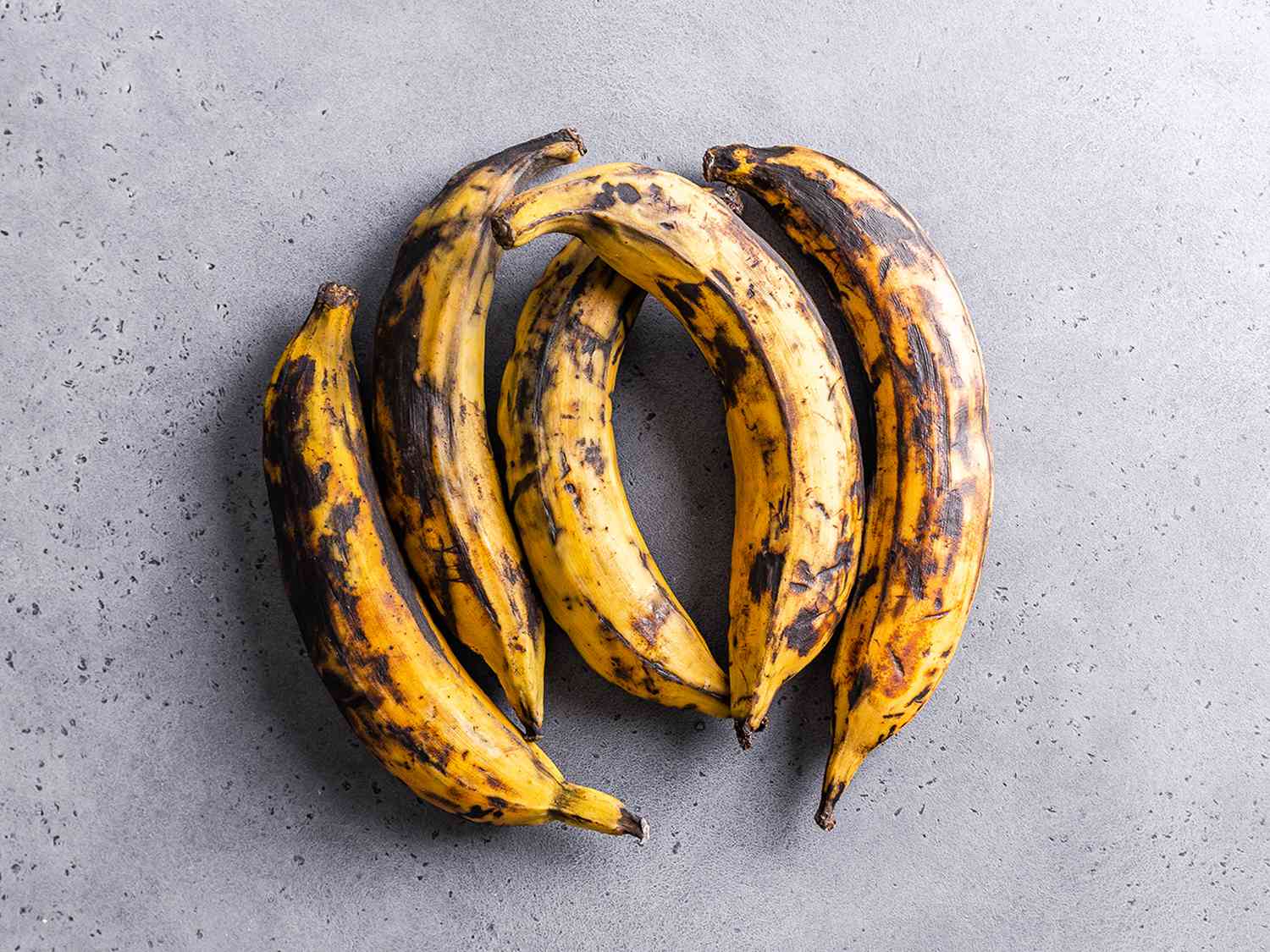 Plantains on a grey marbled surface